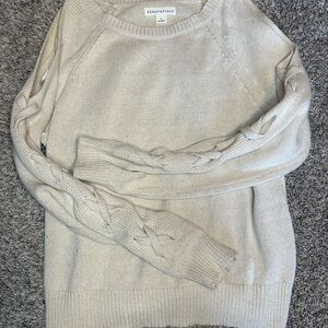 It is a nice and comfy sweater.